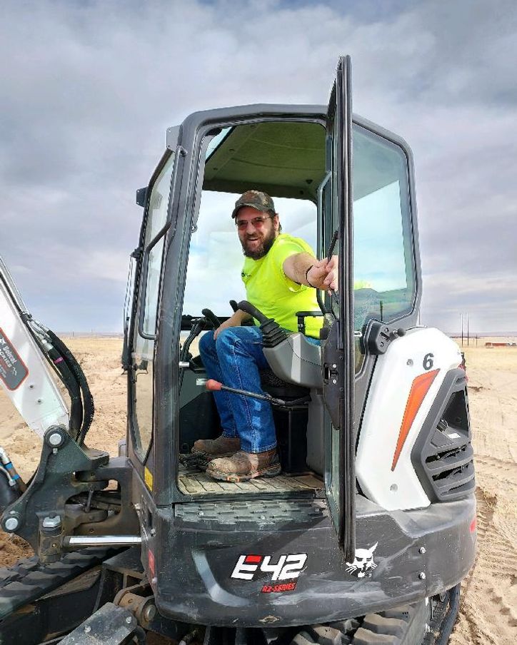 Rob in an excavator