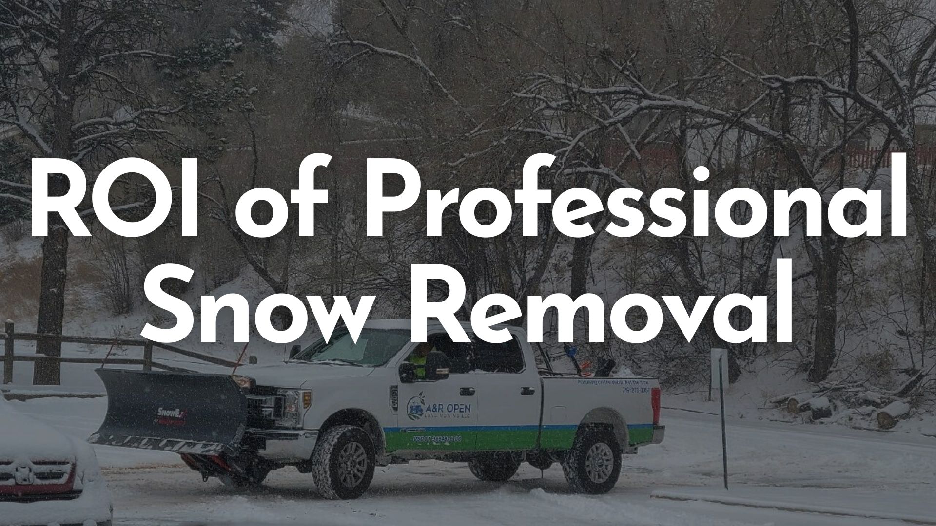 A&R Open Land Mowing's professional snow removal equipment clearing Colorado Springs commercial property to prevent liability and pavement damage